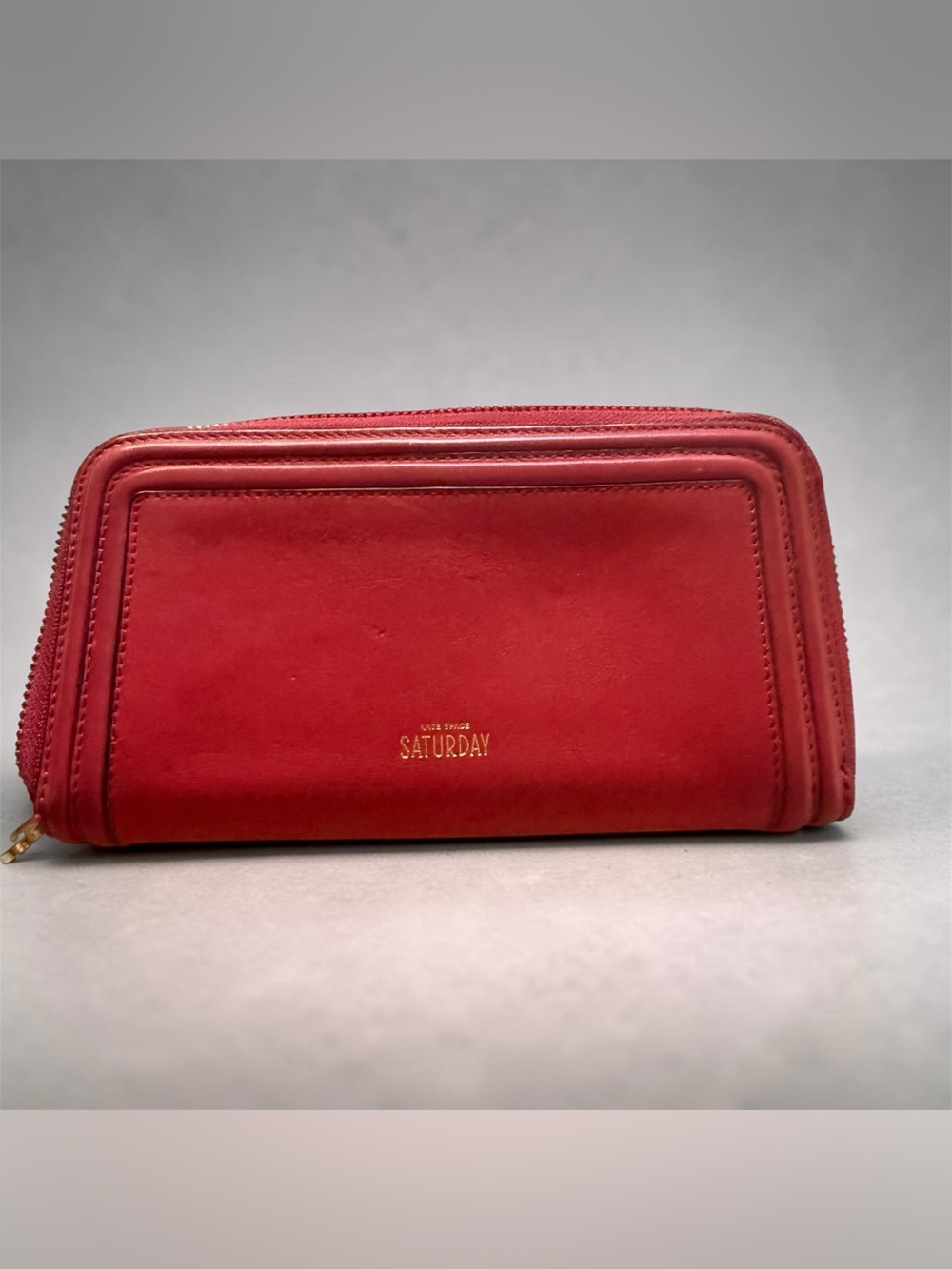 kate spade Saturday red wallet with gold round charm